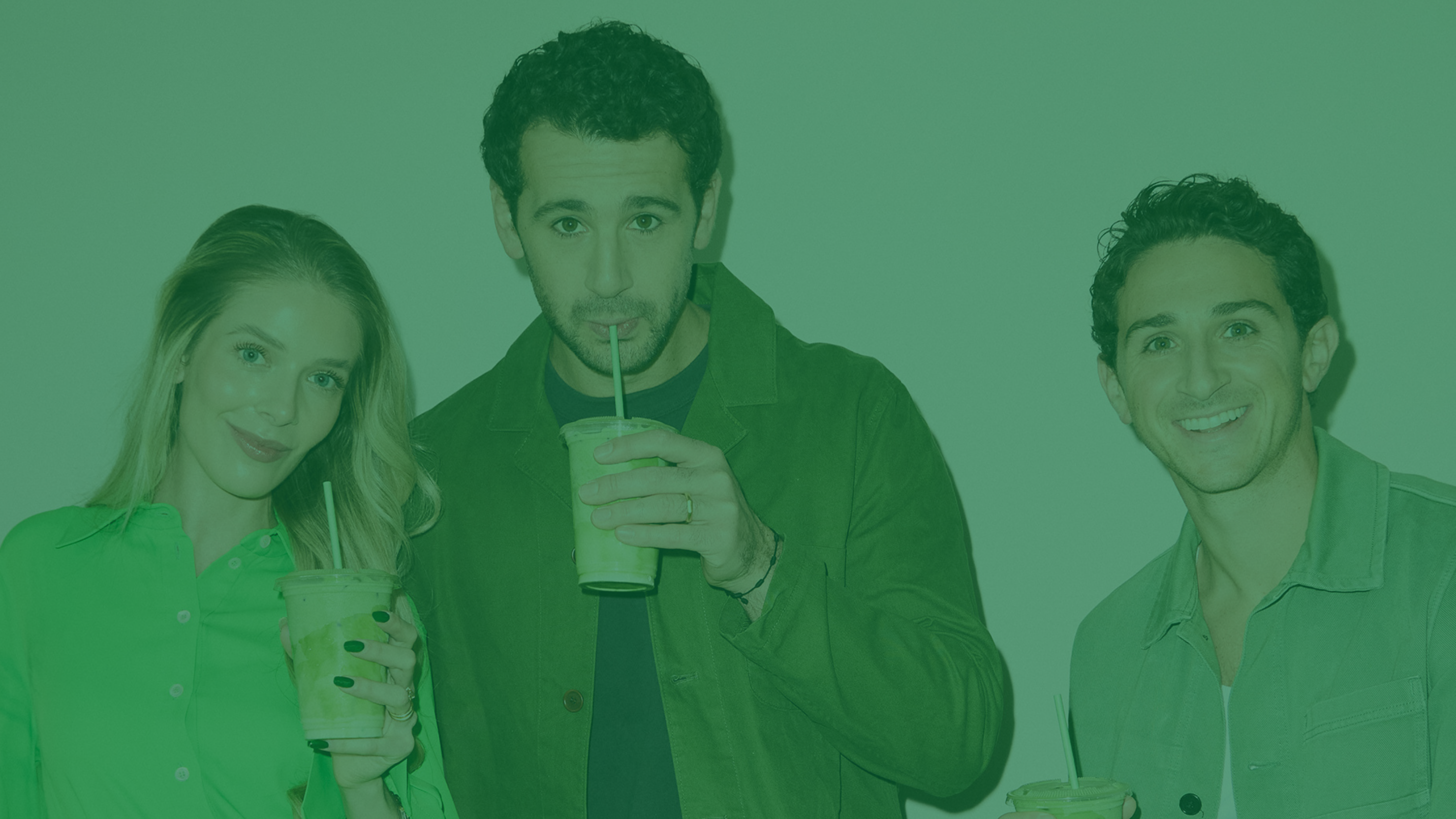 a group of people holding drinks