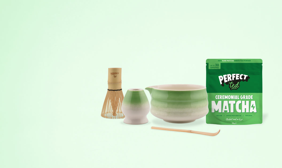 a green and white bowl and a green bag of matcha tea