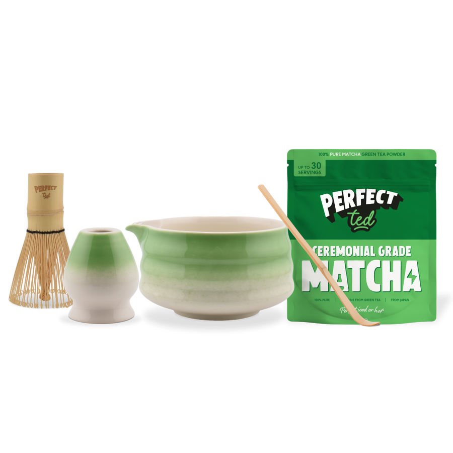 a green and white bowl and a bag of matcha tea