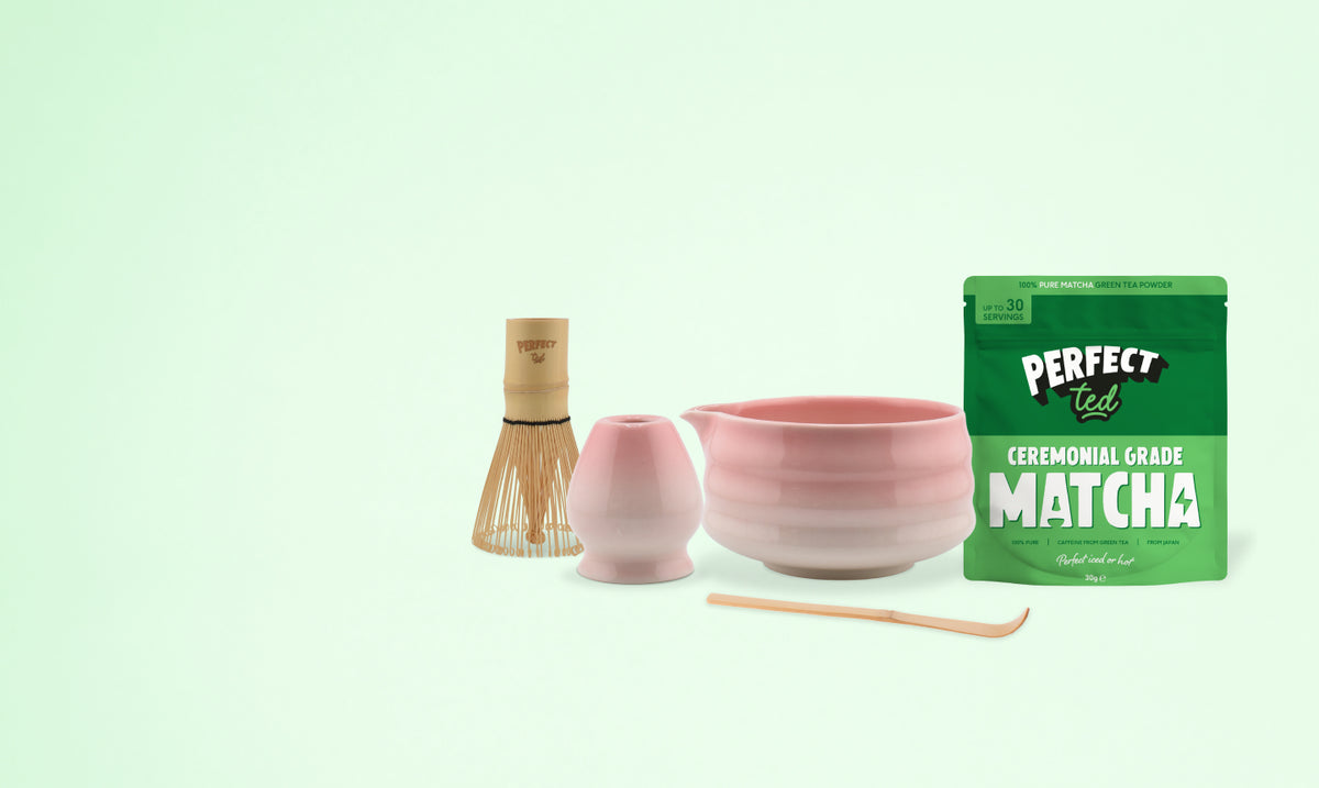 a pink bowl and a green bag of matcha tea