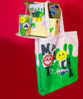 Bundle box with matcha powder and cup in the box with tote bag hanging off the side