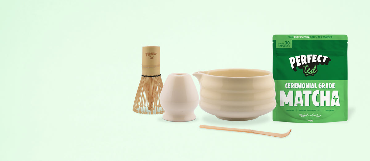 a white bowl and a white cup next to a white bowl and a white cup